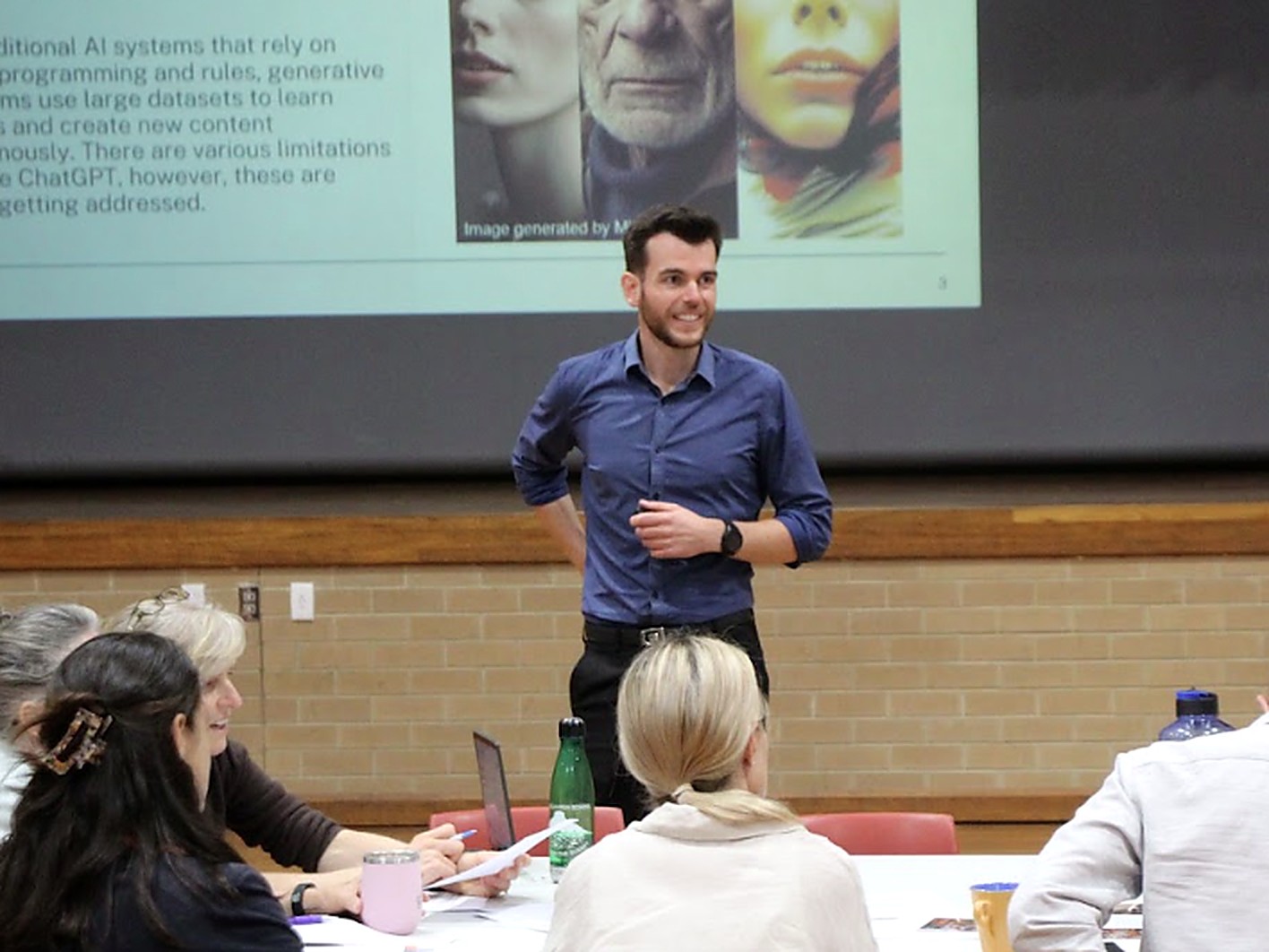 Vaughn Littlejohns listening to teachers during an AI session